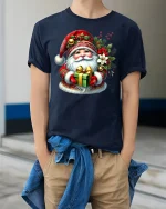 Cute Santa Holding Gift Festive Christmas Graphic Tee Tshirt - model wearing navy tee with hands in pockets