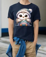Cute Knitting Owl Wearing Winter Hat Cozy Graphic Tee Tshirt - model wearing navy tee with hands in pockets