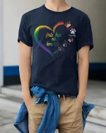 Hate Has No Home Here Rainbow Heart Unity Graphic Tee Tshirt - model wearing navy tee with hands in pockets