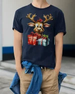 Cute Christmas Reindeer Holding Gifts Adorable Holiday Cartoon Tee - model wearing navy tee with hands in pockets