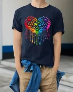 Rainbow Paw Heart Dripping Love Pride Graphic Tee Tshirt - model wearing navy tee with hands in pockets
