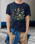 Skeleton King with Serpent Dice Graphic T Shirt Dark Art Tee - model wearing navy tee with hands in pockets