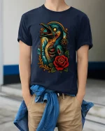 Gothic Raven with Rose Graphic T Shirt Dark Fantasy Art Tee - model wearing navy tee with hands in pockets