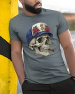 Cool Skull with Cigar Graphic T Shirt Street Art Style Tee - model wearing grey tee, leaning on column