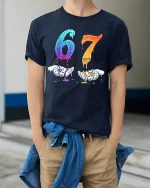Dripping 67 Number Art Graphic T Shirt With Bold Creative Style - model wearing navy tee with hands in pockets