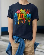 Always Unique Totally Awesome Autism Colorful Graphic T Shirt - model wearing navy tee with hands in pockets