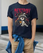 Destroy Teddy Bear Dark Graphic Tshirt With Broken Rebel Art - model wearing navy tee with hands in pockets