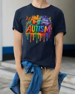 Unique Always Learning Autism Awareness T Shirt With Puzzle Art - model wearing navy tee with hands in pockets