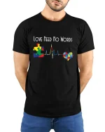 Love Need No Words Autism Puzzle Heartbeat Graphic T Shirt - model wearing black tee with hands behind back