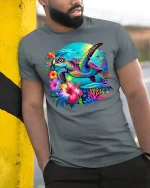 Vibrant Tropical Sea Turtle Graphic T-Shirt for Ocean Lovers - model wearing grey tee, leaning on column