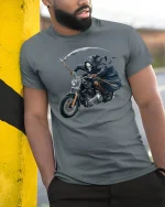 Grim Reaper Motorcycle Rider T-Shirt for Hardcore Bikers - model wearing grey tee, leaning on column