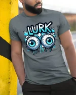 Funny Lurk Eyeball Graphic T-Shirt for Playful Street Style - model wearing grey tee, leaning on column