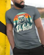 Cool Bear Do Better Tee with Retro Sunset and Motivational Style - model wearing grey tee, leaning on column