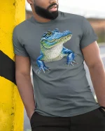 Cool Blue Alligator Tee with Fun Cartoon Gator Artwork - model wearing grey tee, leaning on column