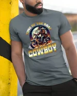 King of the Road Cowboy Motorcycle T-Shirt with Bold Design - model wearing grey tee, leaning on column