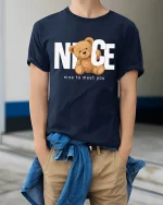 Nice Teddy Bear Tee with Cute Greeting Message Design - model wearing navy tee with hands in pockets