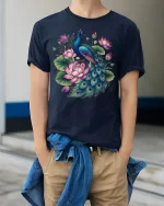 Elegant Peacock and Lotus Flower Beauty Art Graphic T-Shirt - model wearing navy tee with hands in pockets