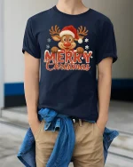 Merry Christmas Reindeer Cute Holiday Snowflakes Graphic T-Shirt - model wearing navy tee with hands in pockets
