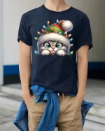 Cute Christmas Kitten Lights Beanie Holiday Cartoon Graphic T-Shirt - model wearing navy tee with hands in pockets
