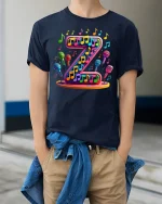 Colorful Letter Z Music Notes Microphone Graphic Art T-Shirt - model wearing navy tee with hands in pockets