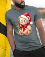 Cute Christmas Teddy Bear Santa Hat Bow Holiday Graphic T-Shirt - model wearing grey tee, leaning on column