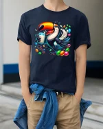 Colorful Toucan Candy Splash Fun Art Graphic Tee - model wearing navy tee with hands in pockets
