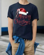 Merry Christmas Santa Hat Candy Cane Festive Holiday Tee - model wearing navy tee with hands in pockets