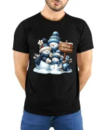 Snowman Family Merry Christmas Winter Scene Holiday Tee - model wearing black tee with hands behind back
