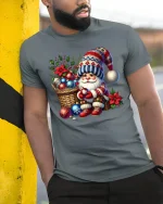 Cozy Christmas Gnome With Ornaments Basket Festive Holiday Tee - model wearing grey tee, leaning on column