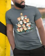 Cute Christmas Cat Tree Santa Hat Holiday Lights Graphic Tee - model wearing grey tee, leaning on column