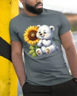 Cute Teddy Bear With Sunflower Smiling Art Graphic Tee - model wearing grey tee, leaning on column