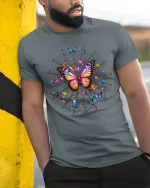 Enchanting Butterfly Web Surreal Graphic Tee - model wearing grey tee, leaning on column