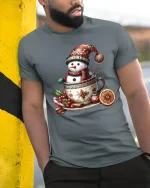 Cute Snowman Cocoa Mug Christmas Graphic T Shirt - model wearing grey tee, leaning on column