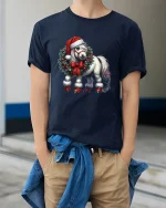 Christmas Pony Wreath Art T Shirt Cute Holiday Magic Graphic Tee - model wearing navy tee with hands in pockets