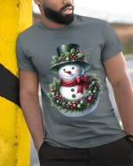 Christmas Snowman T Shirt Cozy Holiday Wreath Art Graphic Tee - model wearing grey tee, leaning on column