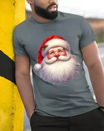 Smiling Santa Face T Shirt Classic Christmas Cheer Graphic Tee - model wearing grey tee, leaning on column