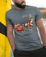 Christmas Reindeer Sleigh Art T Shirt Festive Holiday Magic Tee - model wearing grey tee, leaning on column