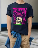 Trippin Skull Mushroom Psychedelic Graphic T Shirt Art - model wearing navy tee with hands in pockets