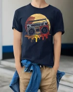 Retro Boombox Sunset Graphic Tee Vintage Music Art T Shirt - model wearing navy tee with hands in pockets