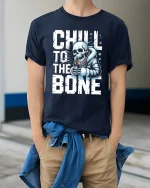 Chill to the Bone Skeleton Winter Graphic T Shirt With Cool Attitude - model wearing navy tee with hands in pockets
