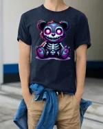 Cute Spooky Skeleton Teddy Bear Neon Art Graphic T Shirt - model wearing navy tee with hands in pockets