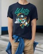 Wats Cool Earth Skateboard Cartoon Street Art Graphic T Shirt - model wearing navy tee with hands in pockets