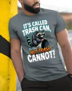 Its Called Trash Can Not Trash Raccoon Funny Graphic T Shirt - model wearing grey tee, leaning on column