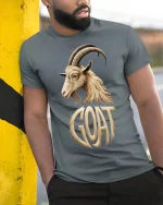 GOAT Greatest Of All Time Bold Goat Illustration Graphic T Shirt - model wearing grey tee, leaning on column