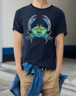 Colorful Mandala Crab Graphic Tee Vibrant Ocean Art - model wearing navy tee with hands in pockets