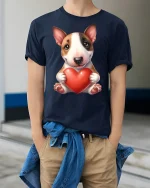 Cute Puppy Love Graphic Tee Adorable Dog Holding Heart Art - model wearing navy tee with hands in pockets