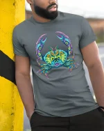Colorful Mandala Crab Graphic Tee Vibrant Ocean Art - model wearing grey tee, leaning on column