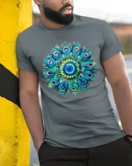 Colorful Peacock Mandala Graphic Tee Vibrant Feather Art - model wearing grey tee, leaning on column
