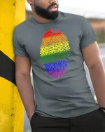Rainbow Fingerprint Graphic Tee Colorful Identity Art - model wearing grey tee, leaning on column