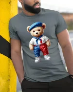 Cute French Teddy Bear Graphic Tee Paris Style Art - model wearing grey tee, leaning on column